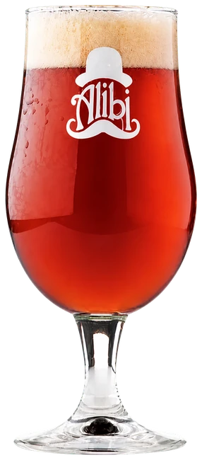 Alibi Munique glass filled with clear amber beer for Dark Saison