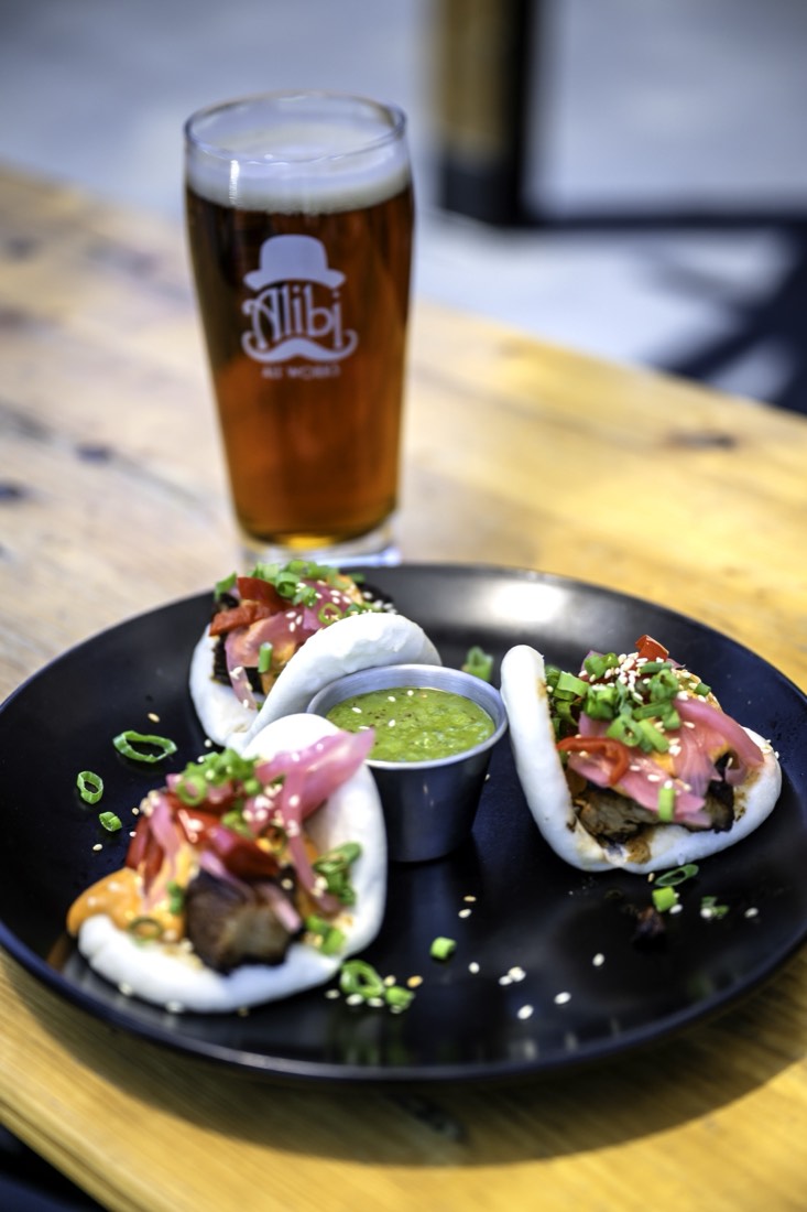 Upscale pub fare served with an Alibi Ale Works beer